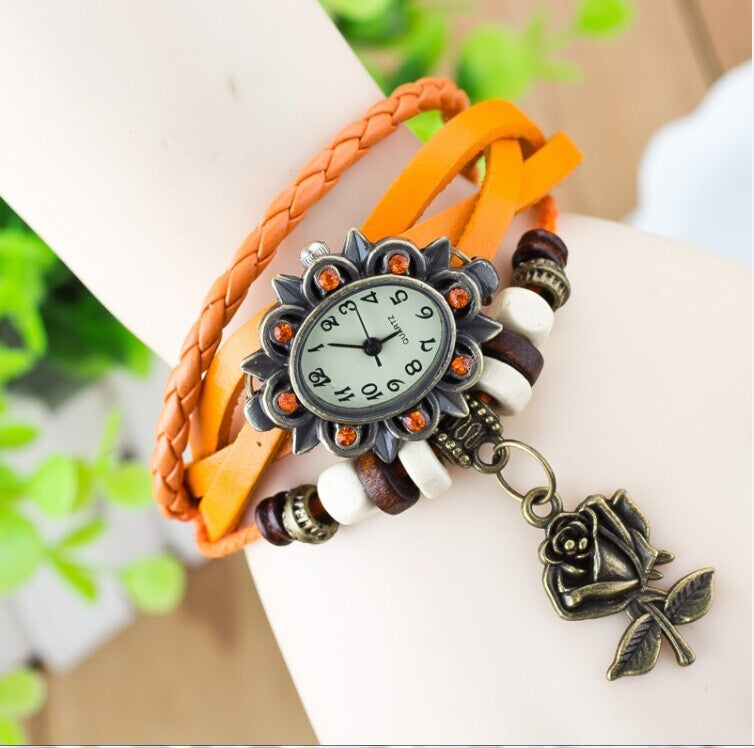 Reloj de moda informal para mujer, pulsera envuelta en cuero, epidermis, colgantes de mariposa para mesa de mujer, venta al por mayor, para niños