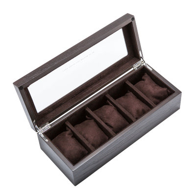 Caja expositora de relojes mecánicos.