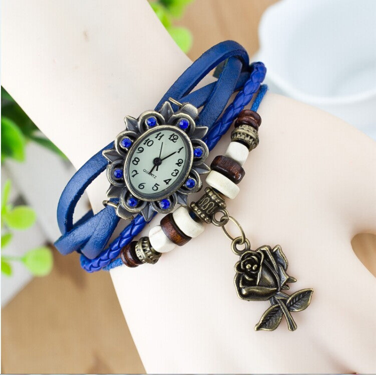 Reloj de moda informal para mujer, pulsera envuelta en cuero, epidermis, colgantes de mariposa para mesa de mujer, venta al por mayor, para niños