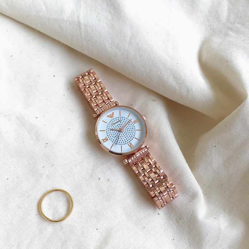Reloj femenino de estilo minimalista de lujo con gran sensación de luminosidad.