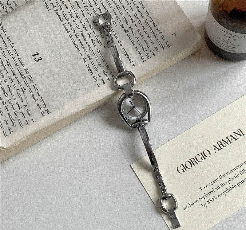 Reloj de pulsera con correa de acero y esfera artística retro de Niche para mujer