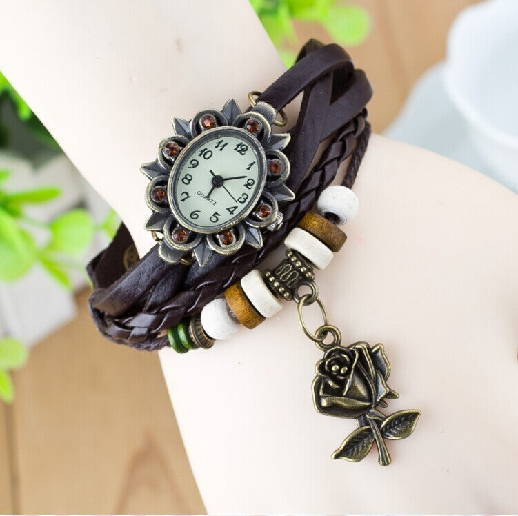 Reloj de moda informal para mujer, pulsera envuelta en cuero, epidermis, colgantes de mariposa para mesa de mujer, venta al por mayor, para niños