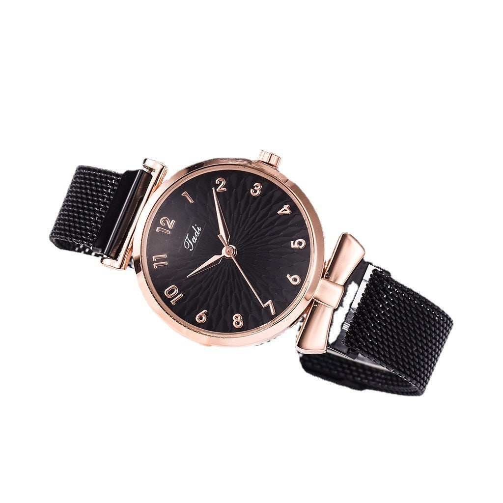 Reloj con correa de malla y imán