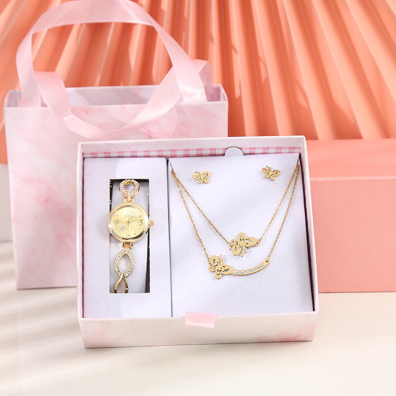 Collar y pendientes con forma de reloj con disco pequeño y brillantes de diamantes