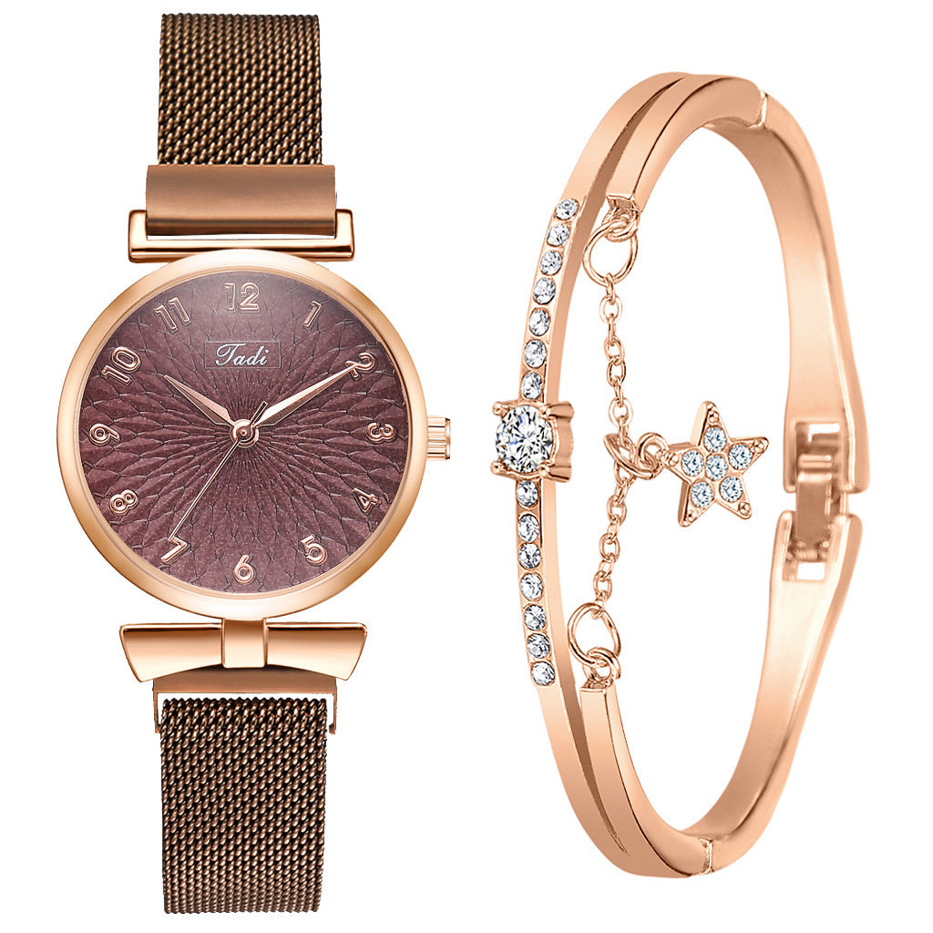Reloj con correa de malla y imán