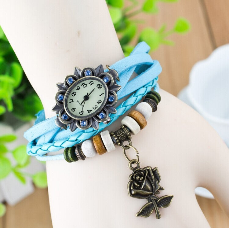 Reloj de moda informal para mujer, pulsera envuelta en cuero, epidermis, colgantes de mariposa para mesa de mujer, venta al por mayor, para niños
