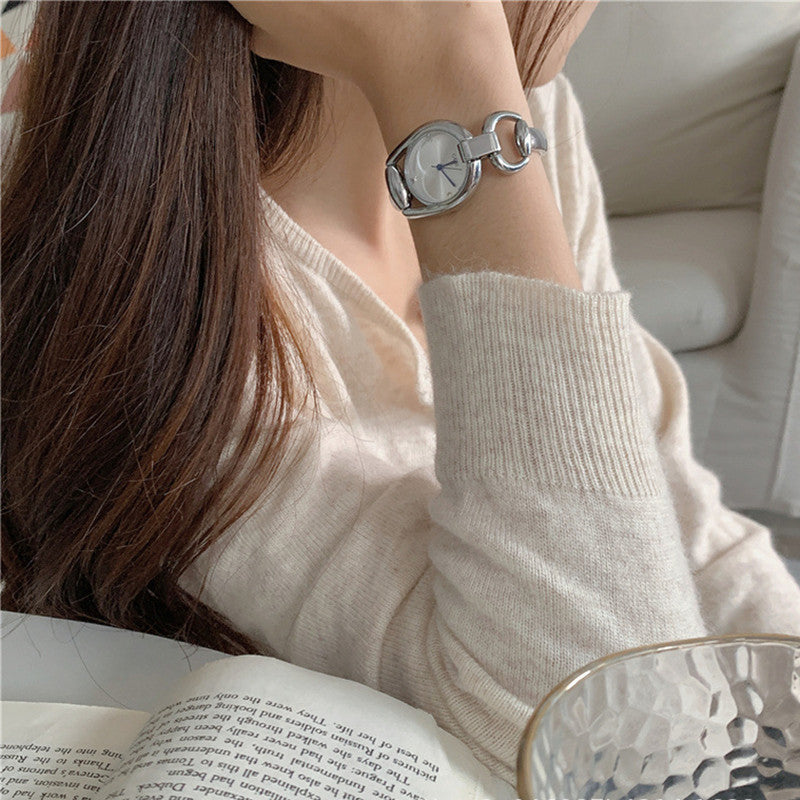 Reloj de pulsera con correa de acero y esfera artística retro de Niche para mujer