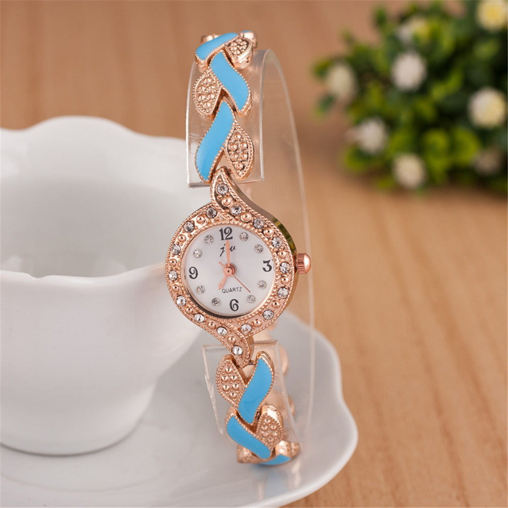 Reloj de pulsera de cuarzo con pulsera de hojas