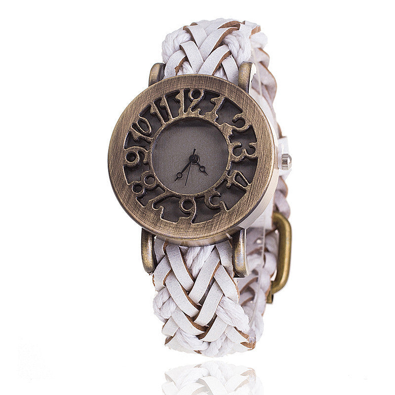 Reloj de pulsera con cabeza hueca retro de cuero tejido, reloj de mujer