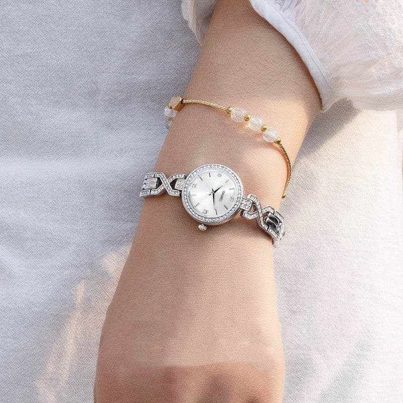 Reloj de pulsera de cuarzo con hebilla de joyería redonda de moda Time Beauty para mujer