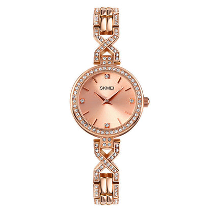 Reloj de pulsera de cuarzo con hebilla de joyería redonda de moda Time Beauty para mujer