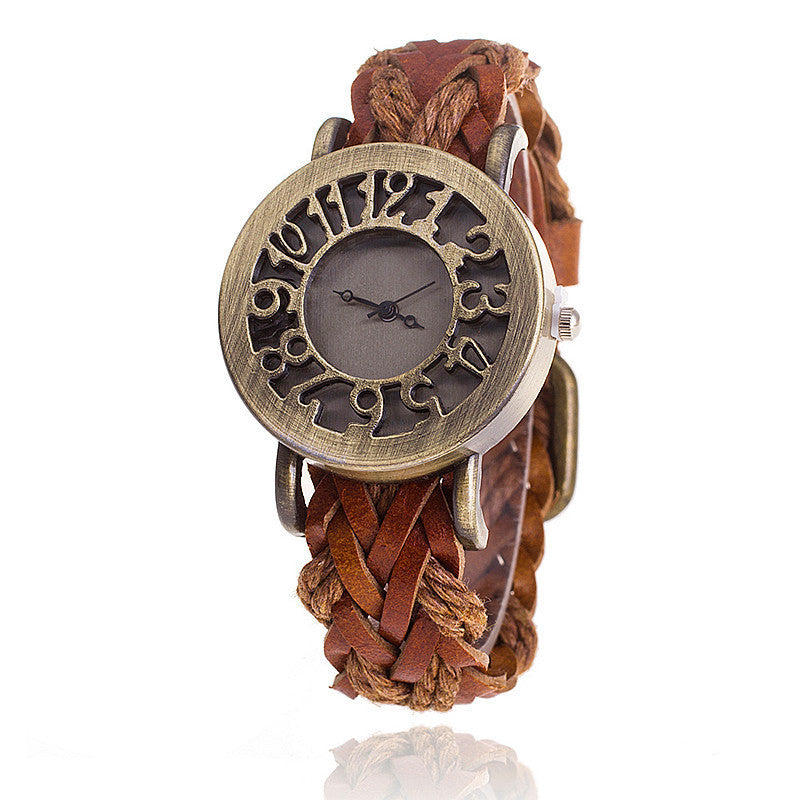 Reloj de pulsera con cabeza hueca retro de cuero tejido, reloj de mujer