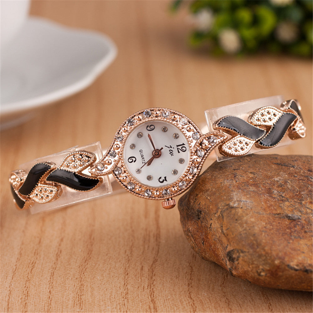 Reloj de pulsera de cuarzo con pulsera de hojas