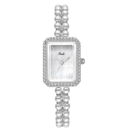 Reloj de cuarzo creativo Shell Pearls para mujer