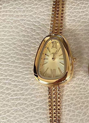 Reloj de cuarzo para mujer con cadena de borlas de alta calidad y cabeza de serpiente