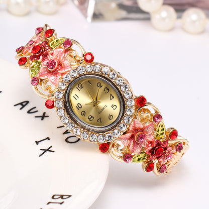 Reloj hueco con incrustaciones de flores