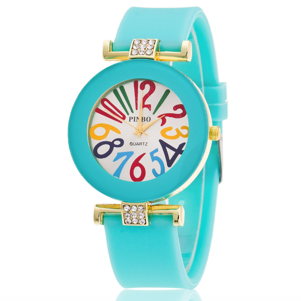 Reloj digital en color gelatina con diamantes.