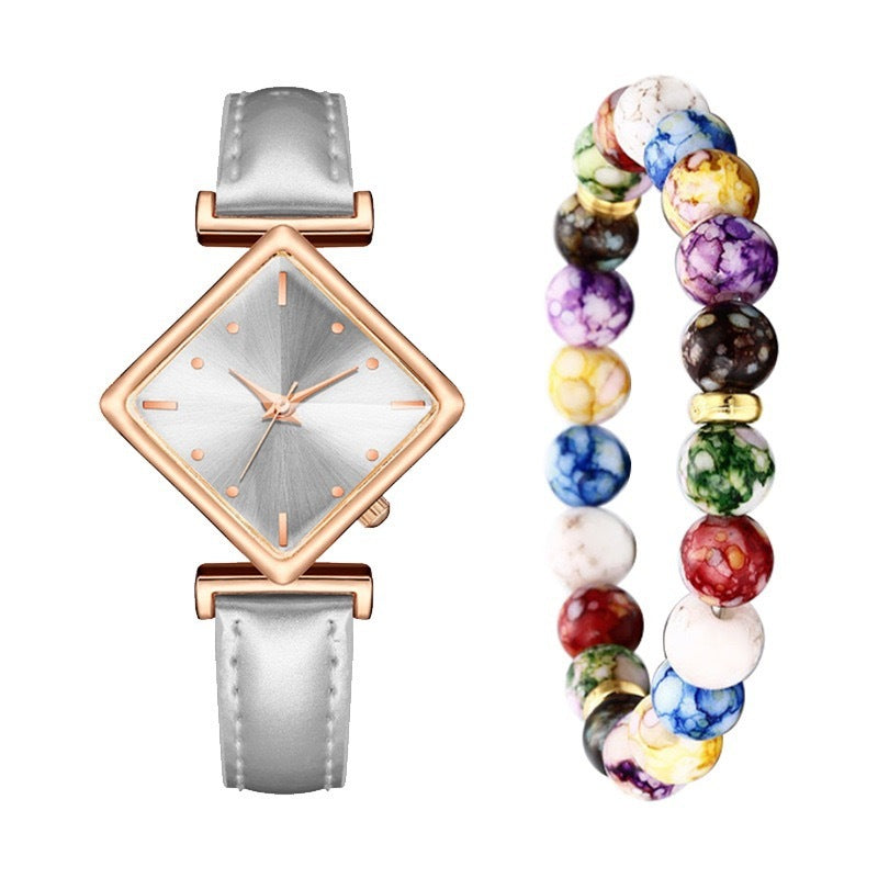 Elegante reloj de mujer con correa fina y esfera de diamantes