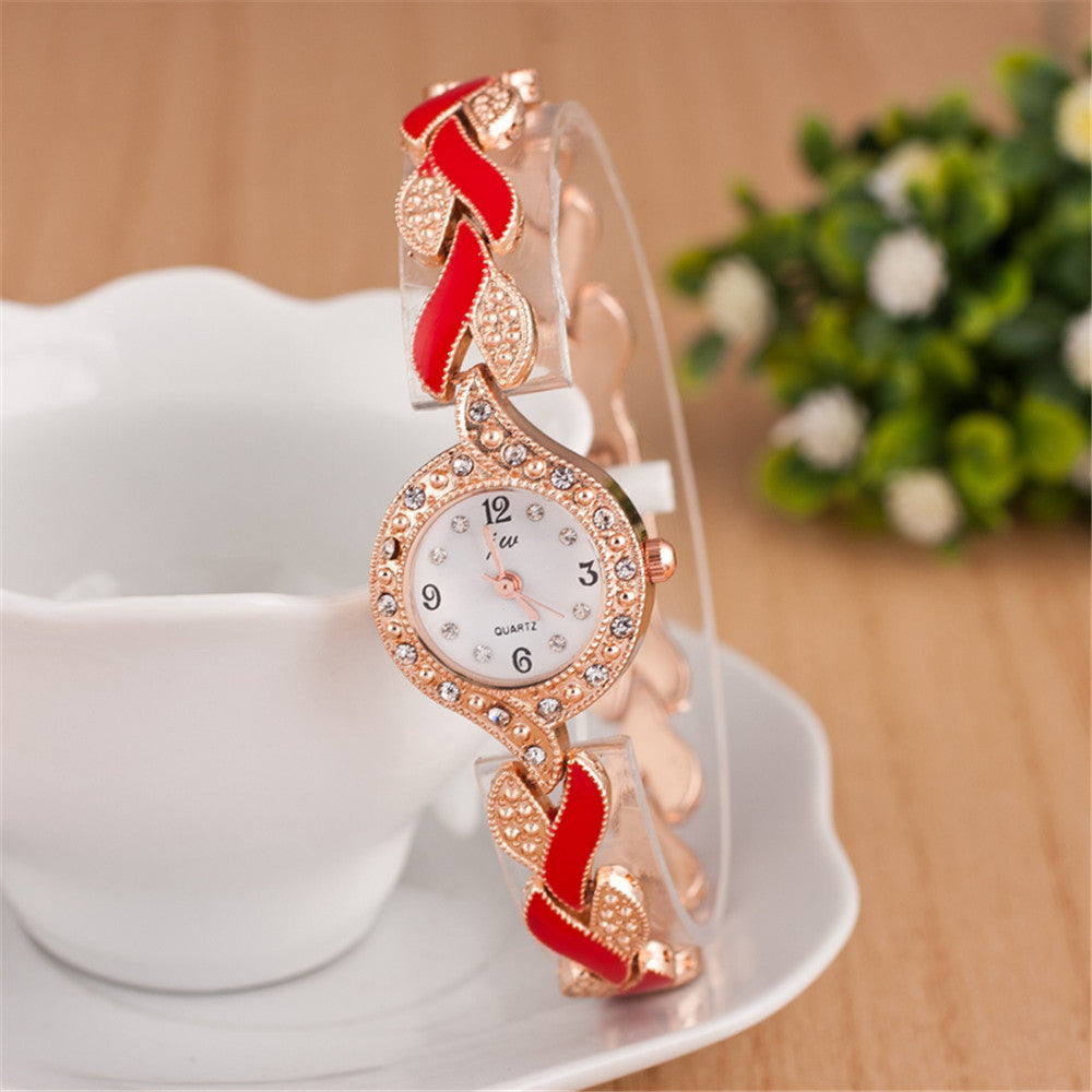 Reloj de pulsera de cuarzo con pulsera de hojas