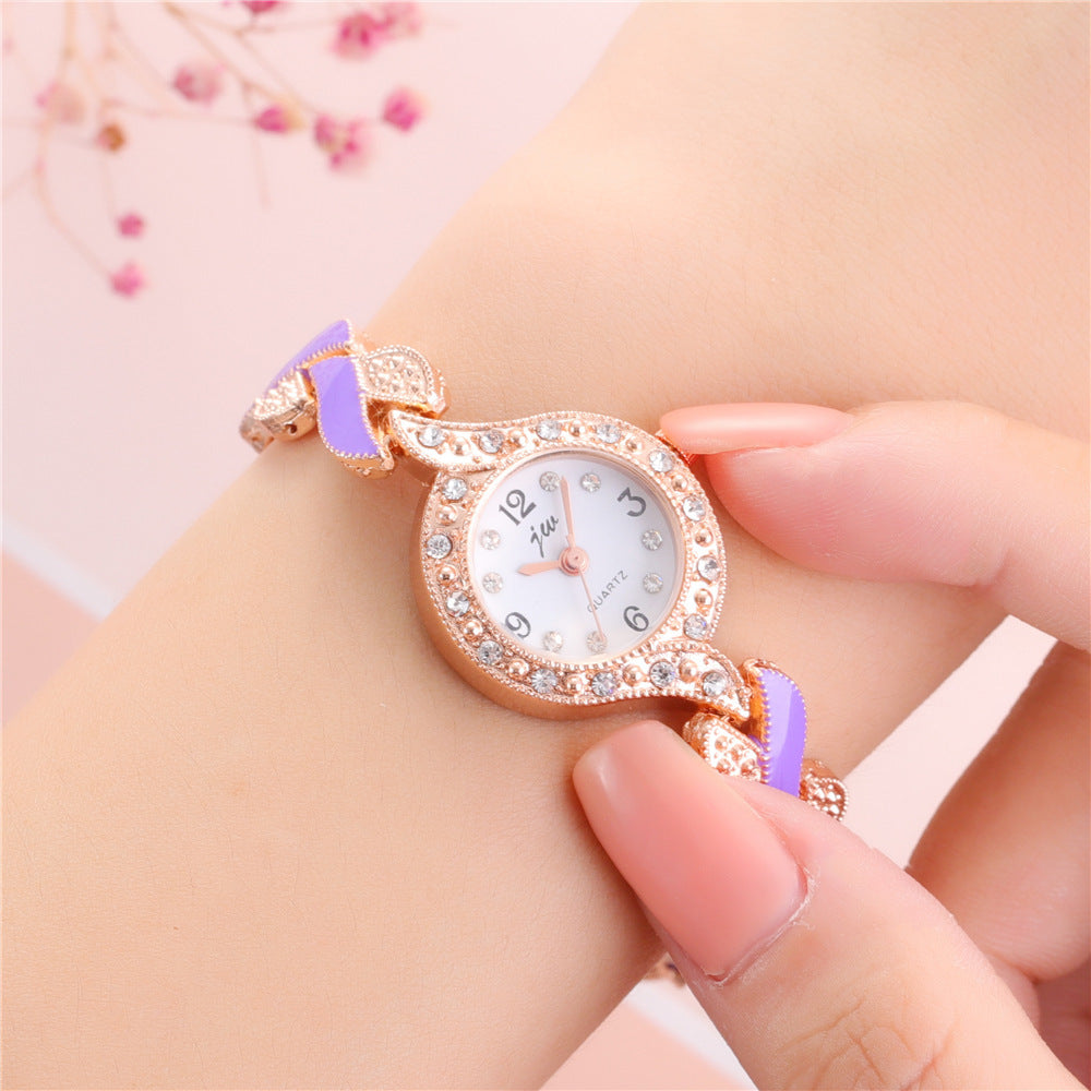 Reloj de pulsera de cuarzo con pulsera de hojas