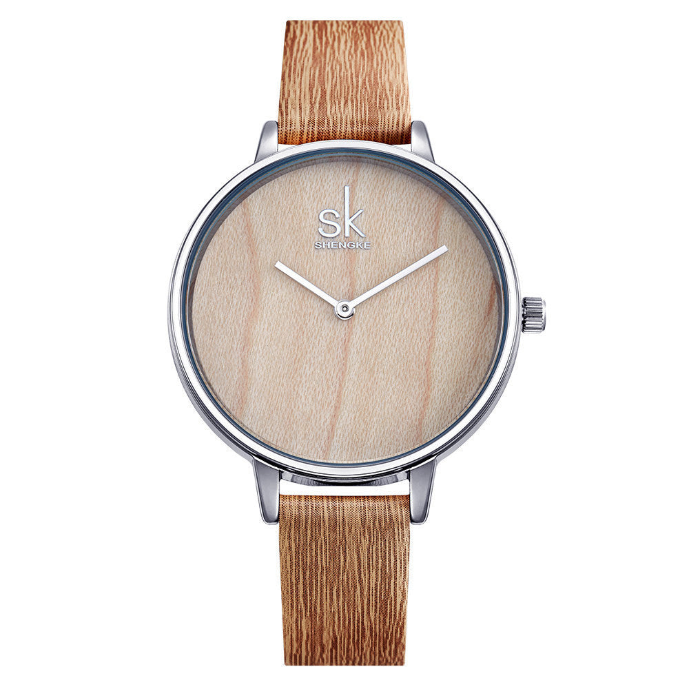 Reloj de cuarzo para mujer con aguja de madera.