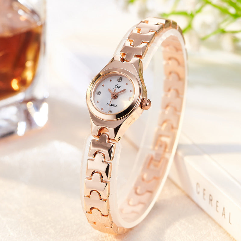 Reloj de pulsera con correa fina y esfera pequeña de acero de moda para mujer