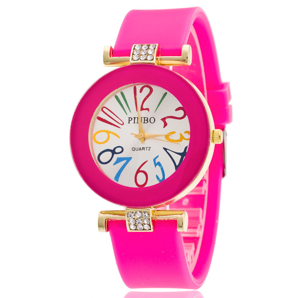 Reloj digital en color gelatina con diamantes.