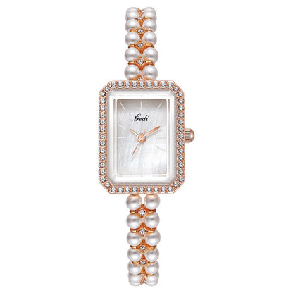 Reloj de cuarzo creativo Shell Pearls para mujer