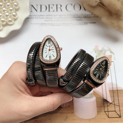 Relojes Cussi para mujer, reloj de pulsera de lujo con forma de serpiente para mujer, reloj de cuarzo dorado único de acero para mujer, reloj femenino 2021