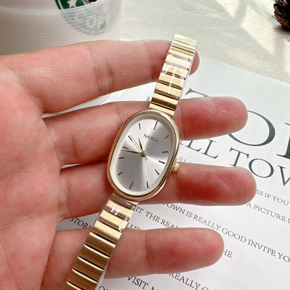 Women Quartz Watch Luxury Oval Shaped Fashion Mini Case Small Roman Numeral Dial Female Full Metal Band Watches Niche Wristwatch