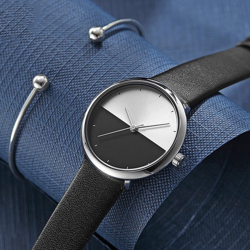 Cinturón de reloj para hombre y mujer sobre la mesa cálido y frío de dos colores