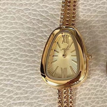 Reloj de cuarzo para mujer con cadena de borlas de alta calidad y cabeza de serpiente