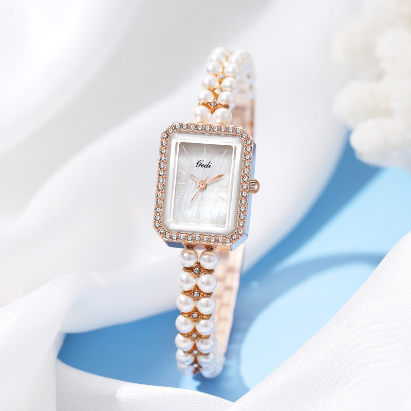 Reloj de cuarzo creativo Shell Pearls para mujer