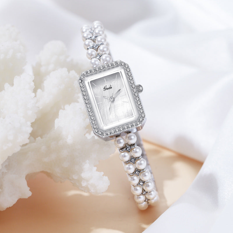 Reloj de cuarzo creativo Shell Pearls para mujer